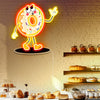 Donut cartoon character neon sings